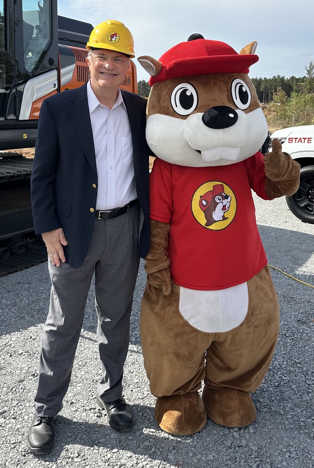 Bruce Siegmund in a hard hat with the Buc-ee's mascot at the groundbreaking for the new Buc-ee's Travel Center in Ruston