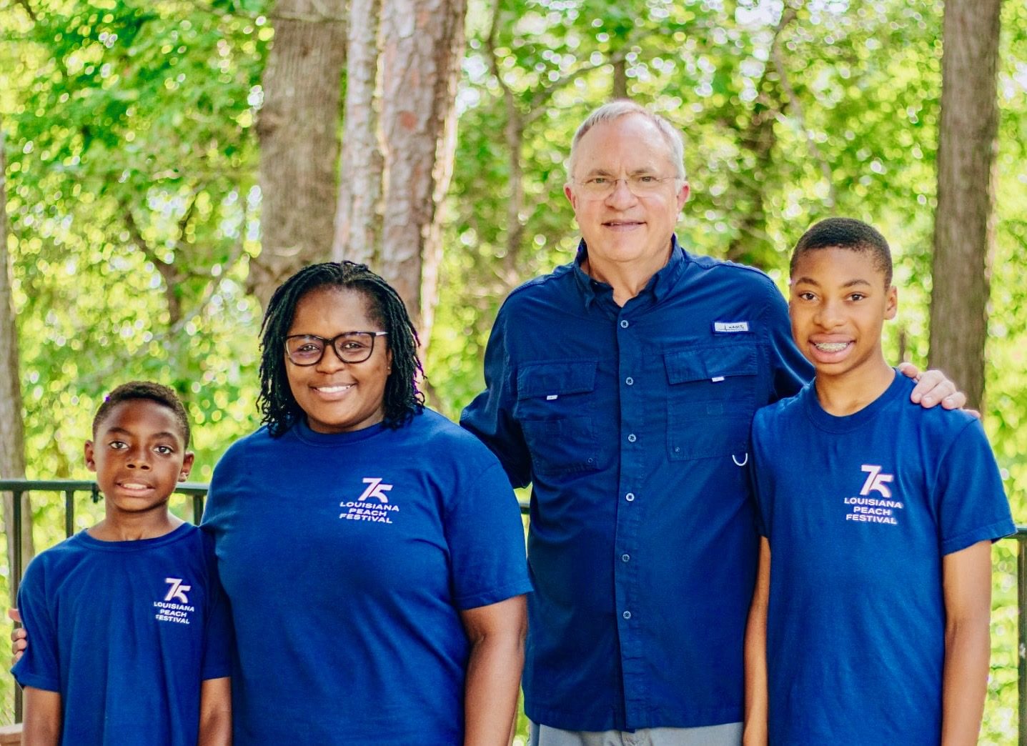 Bruce Siegmund with his family celebrating the 75th Louisiana Peach Festival